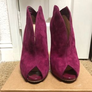 Magenta Louboutin peep toe booties